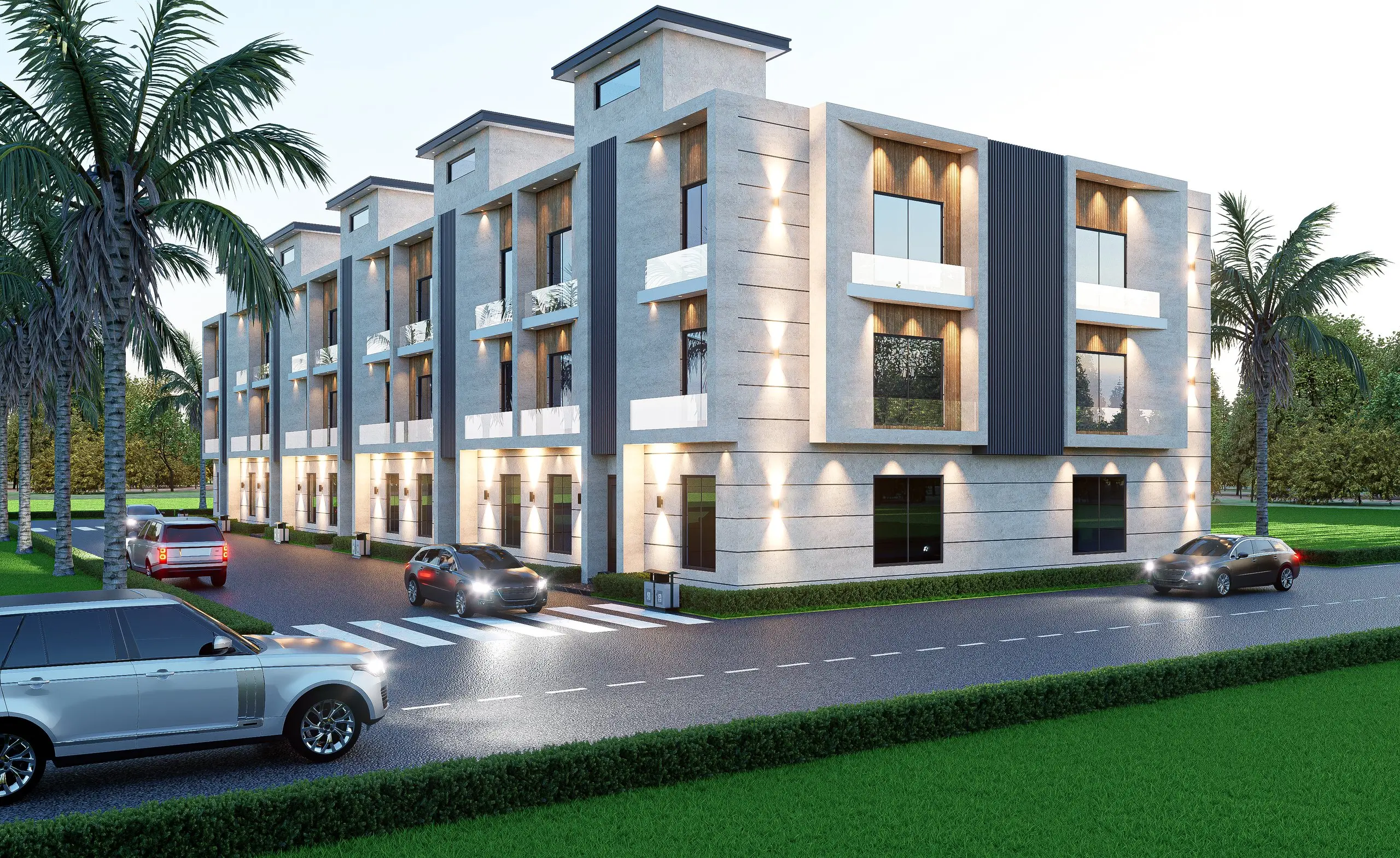 Luxury Pine Villas townhouse row glowing with warm façade lighting at dusk